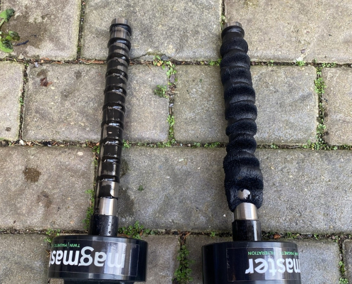 Magnaclean filters showing sludge and debris removed from a heating system during power flushing